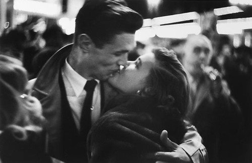 Couple Kissing, New Years Eve, NYC; captured by Jay Maisel (1950)