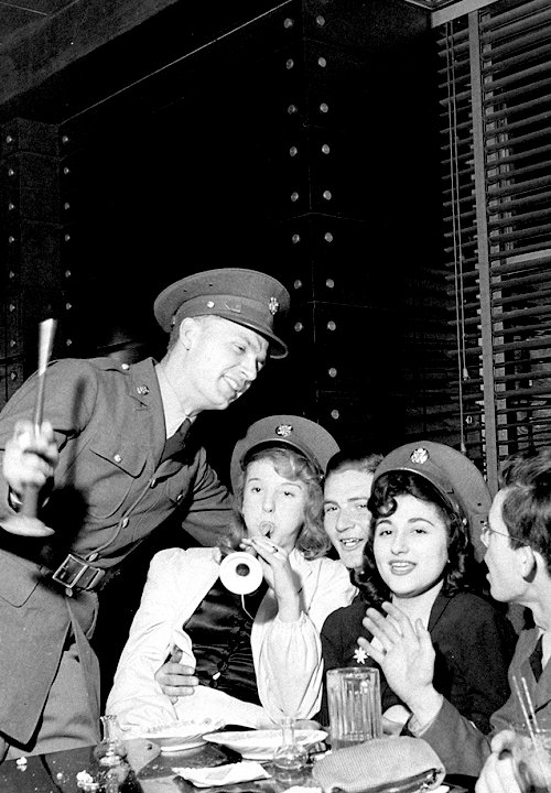 Partiers in New York City on New Year’s Eve, as 1941 turns to 1942.