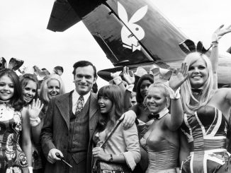 Hugh Hefner with his women and his jet, 1970.